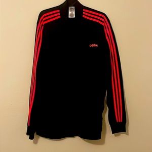 Adidas track jacket never worn size 2xl black with orange detail strips.